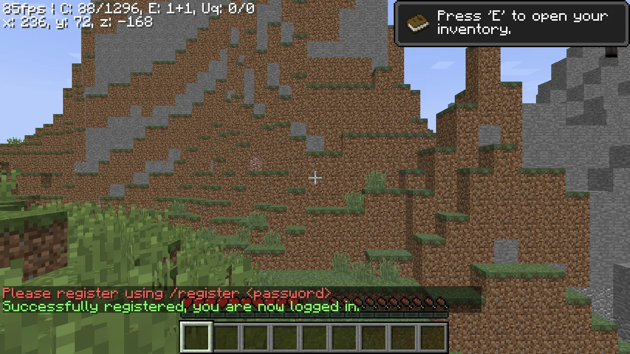 In-game chat in the Eaglercraft client showing the Please register using /register password prompt above the Successfully registered, you are now logged in confirmation.